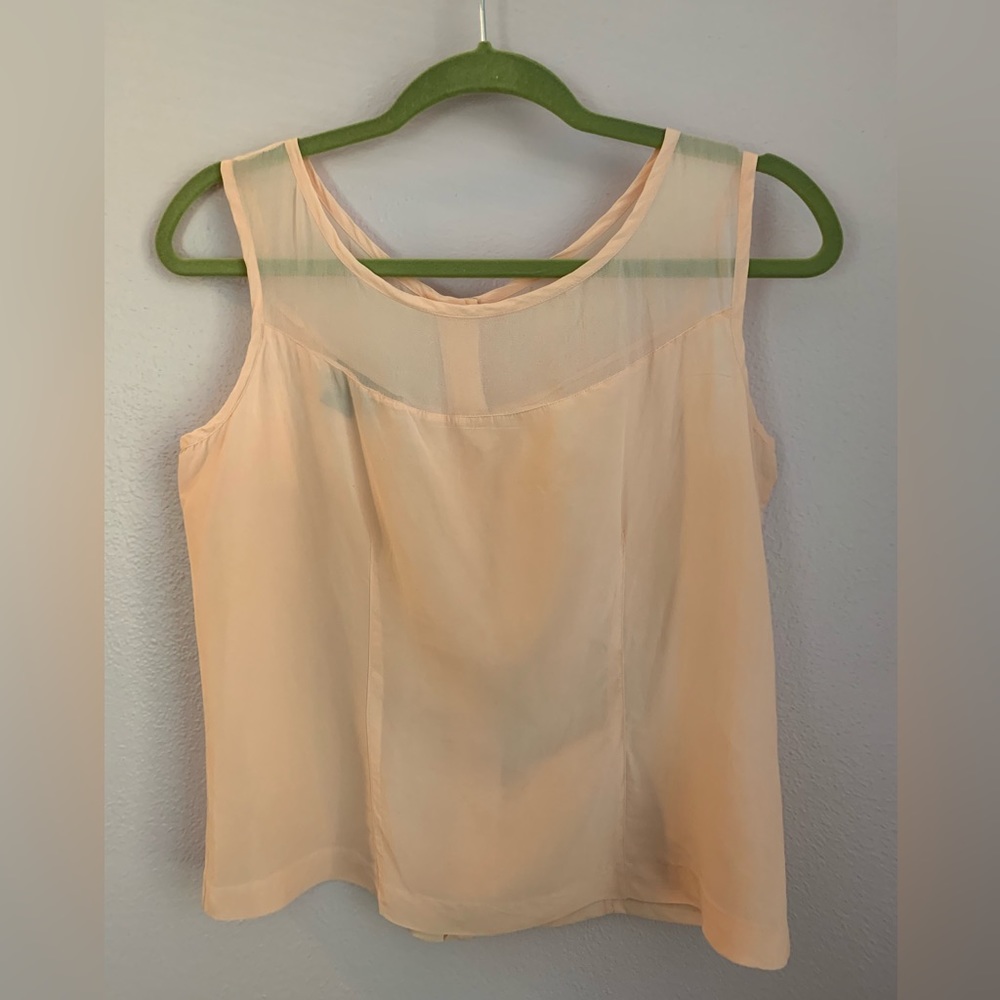Silk sleeveless blouse in shell pink